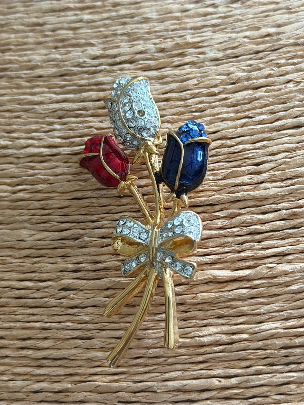 Red white and blue crystal roses bouquet with a pave crystal bow brooch